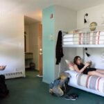 A single bed in a dorm room at the Samesun Banff Backpacker Lodge may be the cheapest place to stay in Banff, Alberta