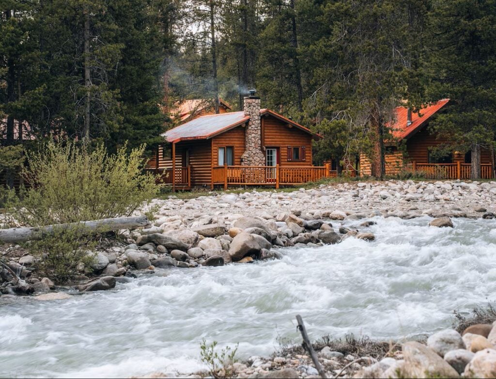 the riverside natural setting of the Baker Creek Resort in Banff National Park.