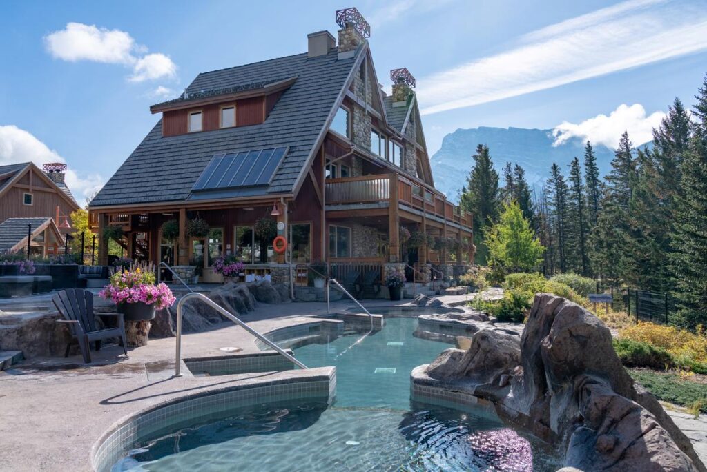a beautiful outdoor hot tub in a natural setting at the Hidden Ridge Resort on Tunnel Mountain near the Town of Banff.