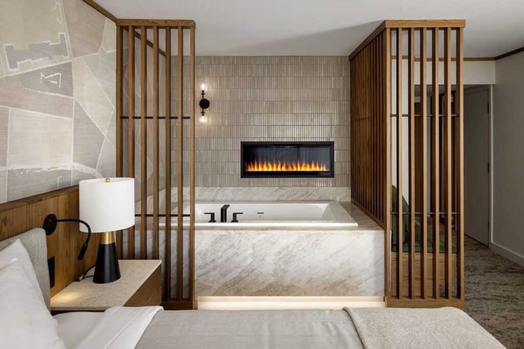 a hotel room with a jetted tub at the Banff Park Lodge.