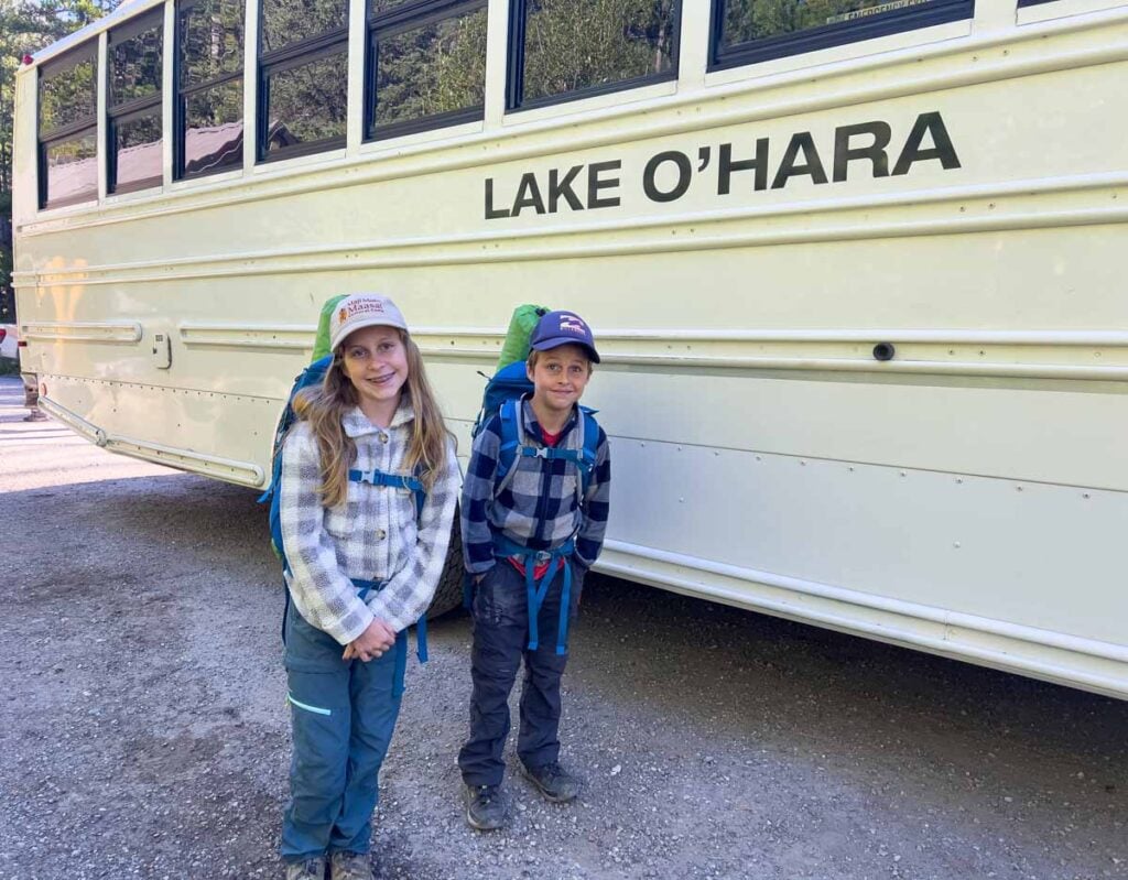 The Brewer kids from TravelBanffCanada.com are excited to take the Lake O'Hara shuttle bus for 2 nights of backcountry camping.