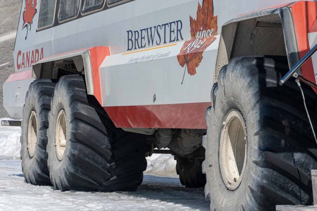 A close-up of the massive tires on an Ice Explorer all-terrain vehicle at the Columbia Icefields.