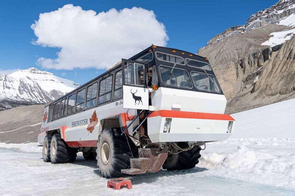 An Ice Explorer all-terrain vehicle on top of the Athabasca Glacier on a Columbia Icefield Adventure Tour.