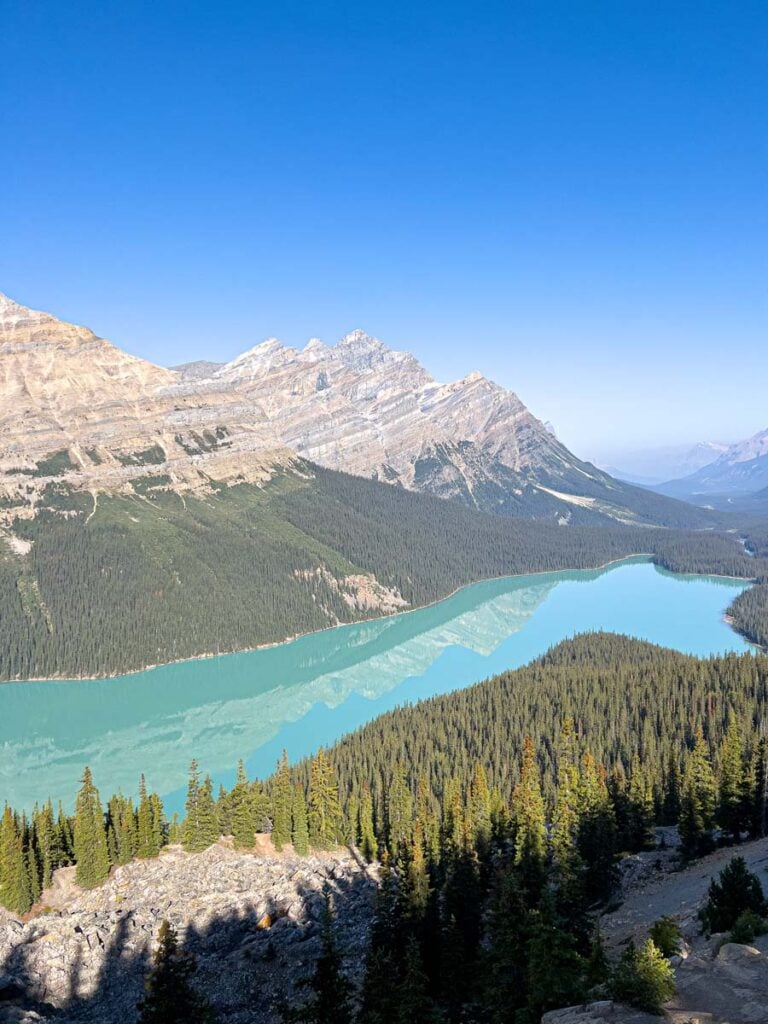 Caldron Peak reflects in the still water of Peyto Lake in Banff.