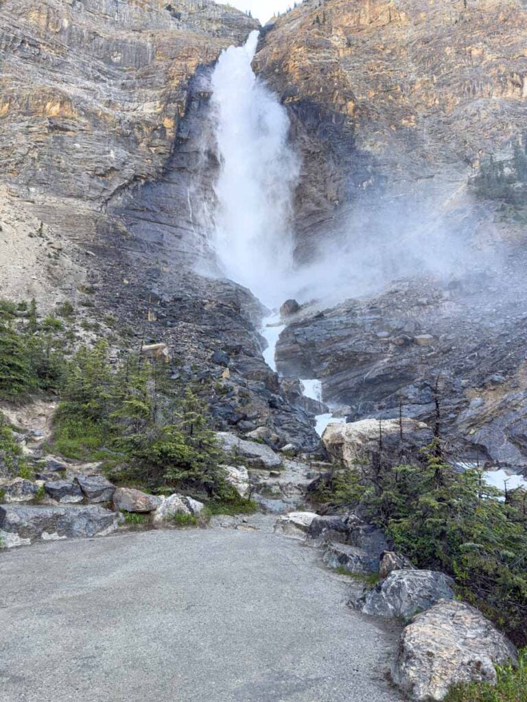 The paved viewing area at the base of Takakkaw Falls in Yoho National Park, Canada.