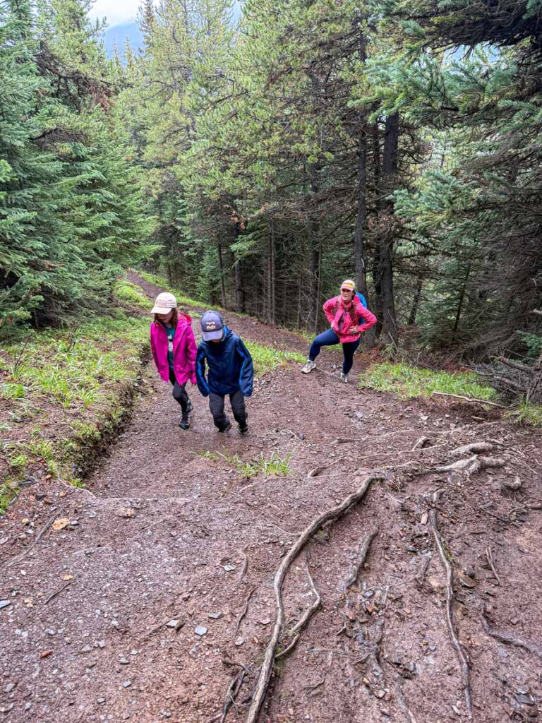 Celine Brewer, owner of TravelBanffCanada.com, hikes a challenging section of the Opal Hills Loop trail with her kids on a family trip to Jasper.