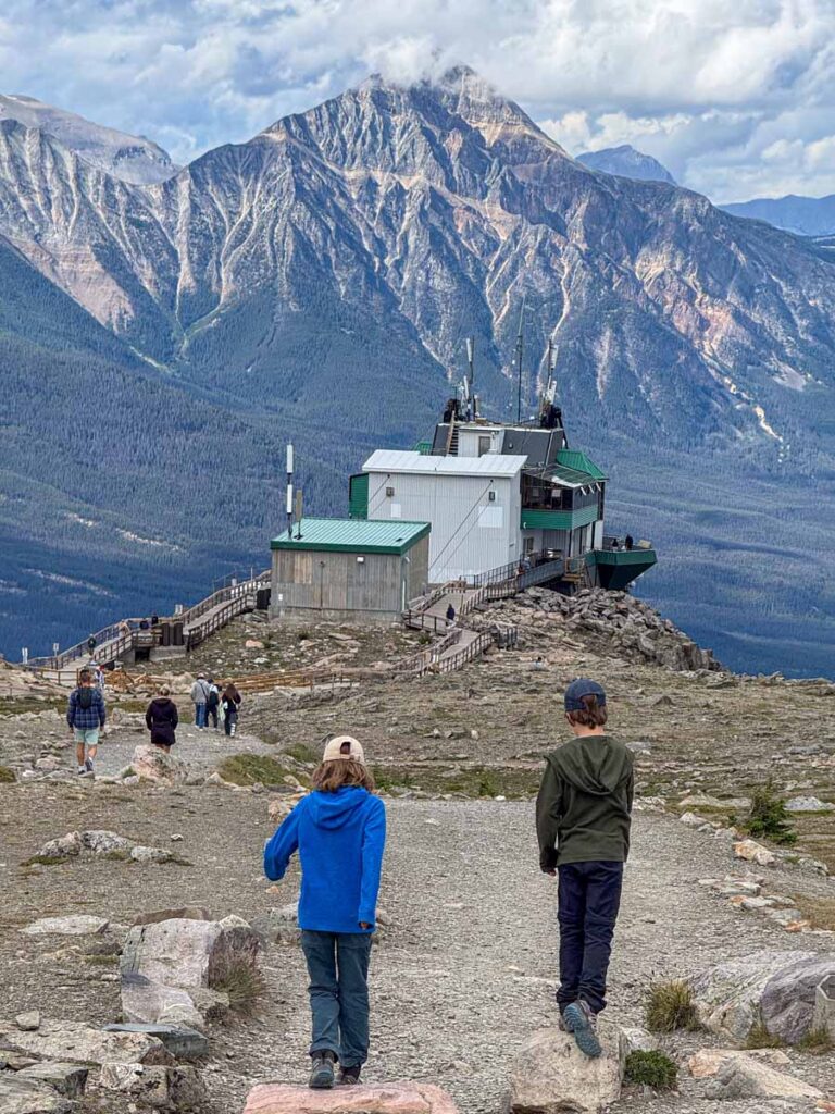 The Brewer kids from the TravelBanffCanada.com blog, walk down the Summit Trail towards the Upper Terminal at the Jasper SkyTram.