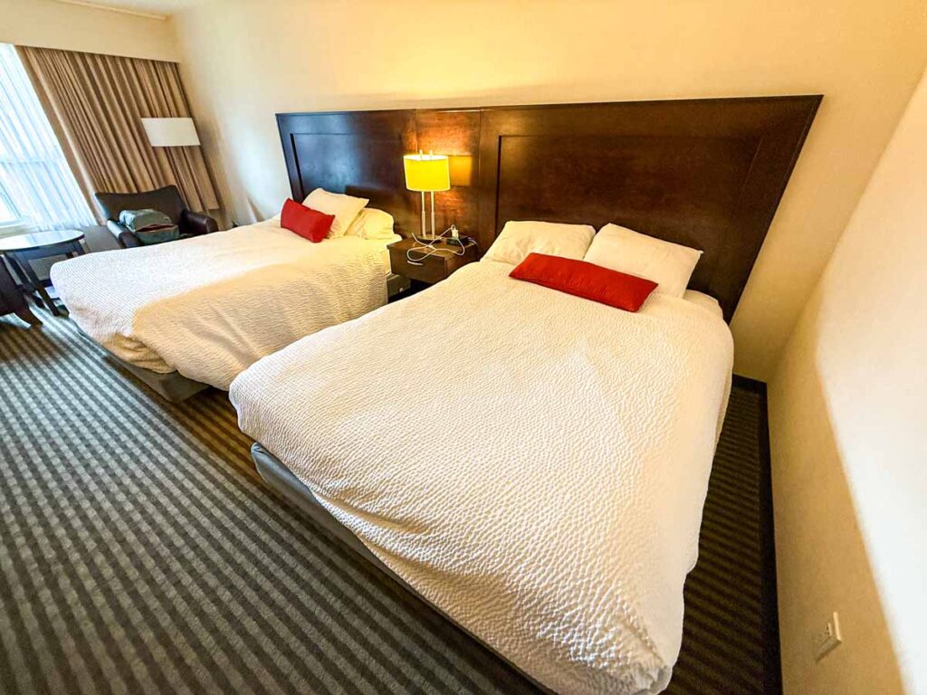 A standard 2 queen room at the Marmot Lodge in the Town of Jasper.