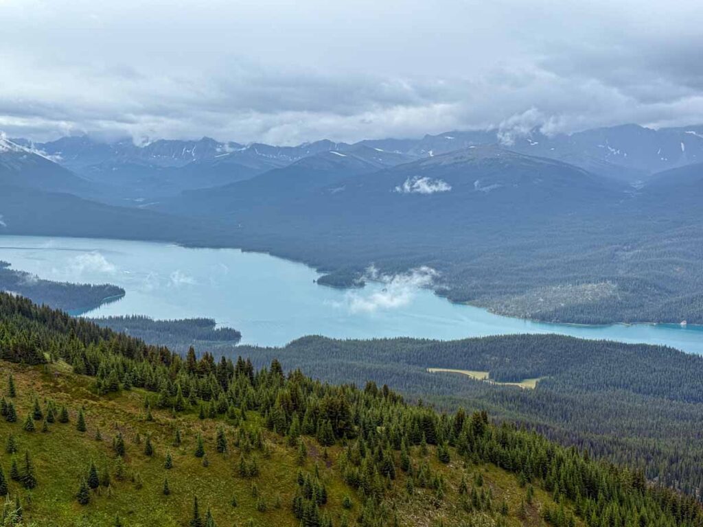 An aerial vista of Maligne Lake from the Opal Hills Loop hiking trail in Jasper National Park.