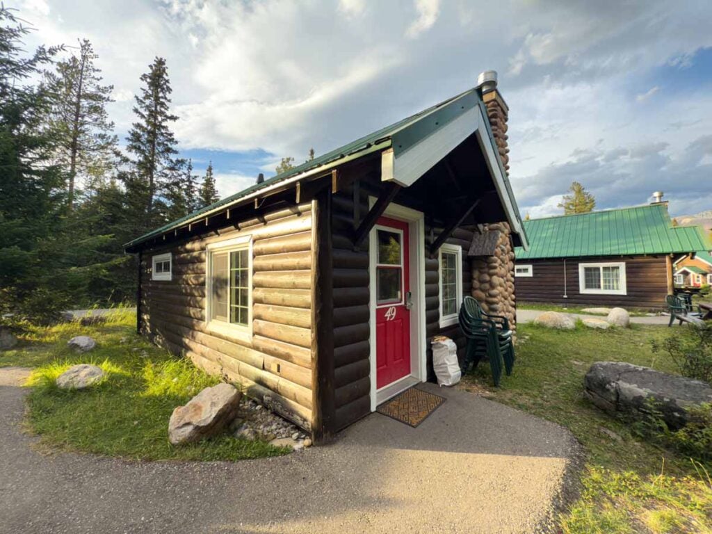 The East Cabin is a charming family-friendly cabin in the woods at the Pine Bungalows in the Town of Jasper.