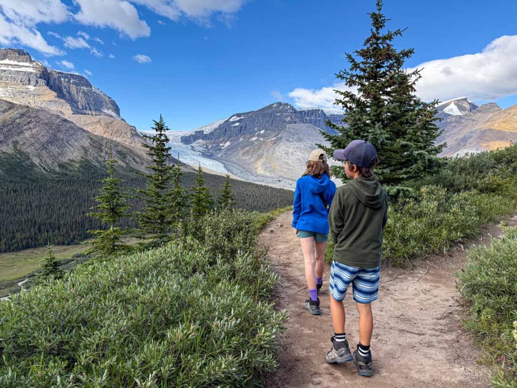 The Brewer kids from the Travel Banff Canada blog, hike to the red chairs on Wilcox Pass during a family trip on the Icefields Parkway.