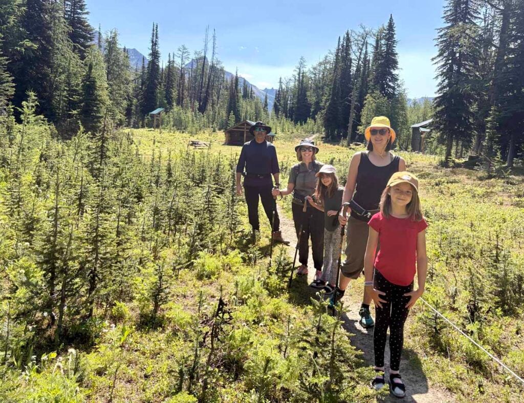 a family enjoys an immersive nature experience in the Canadian Rockies with Among the Trees Canada.
