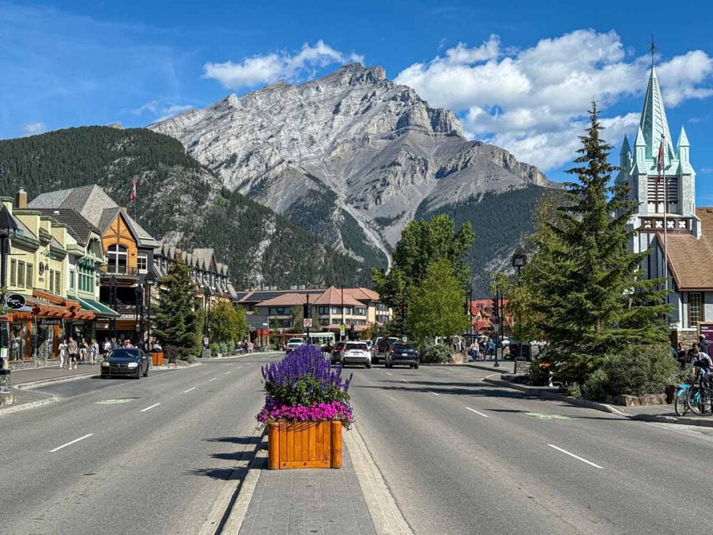 Cascade Mountain looms large over Banff Avenue in summer.