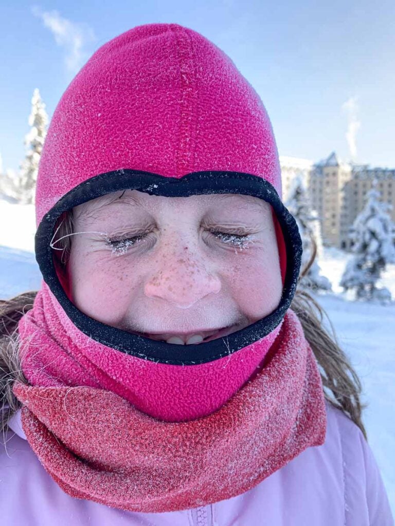 A Brewer child has frost on her eyelashes on a cold day ice skating at Lake Louise.