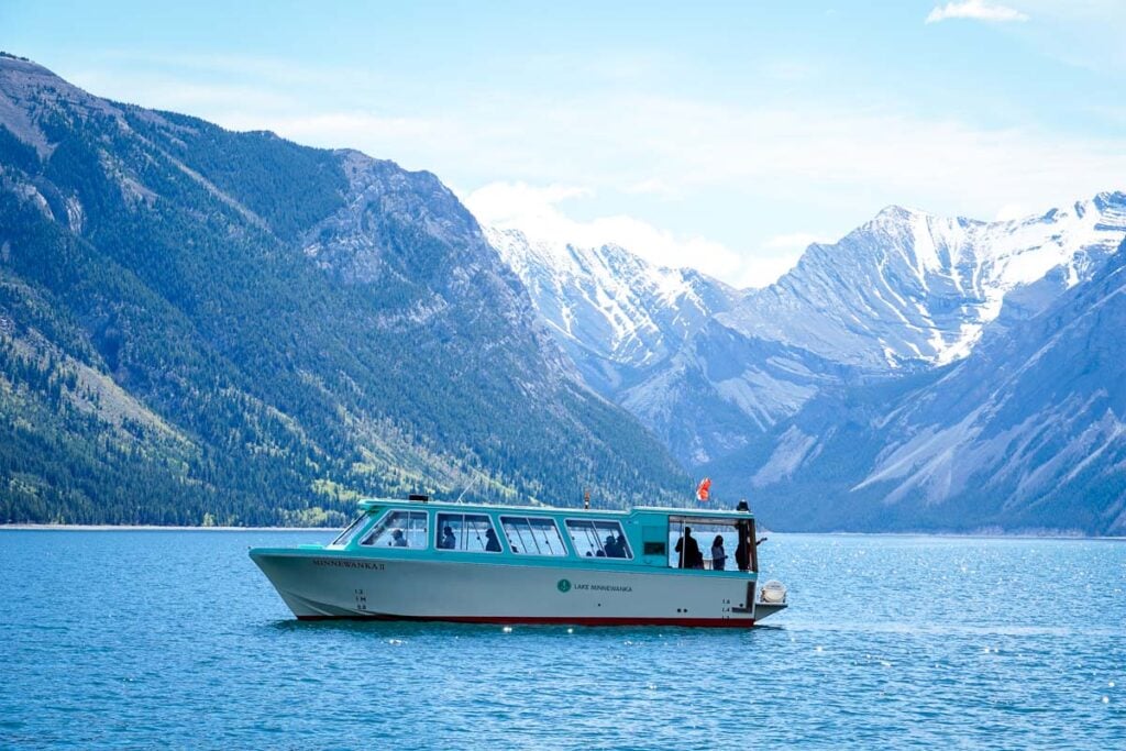 Lake Minnewanka boat cruise running in late May.