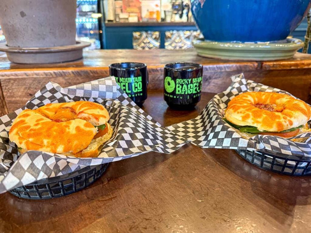 Two Amigo bagels and coffee at the Rocky Mountain Bagel Co in downtown Canmore.