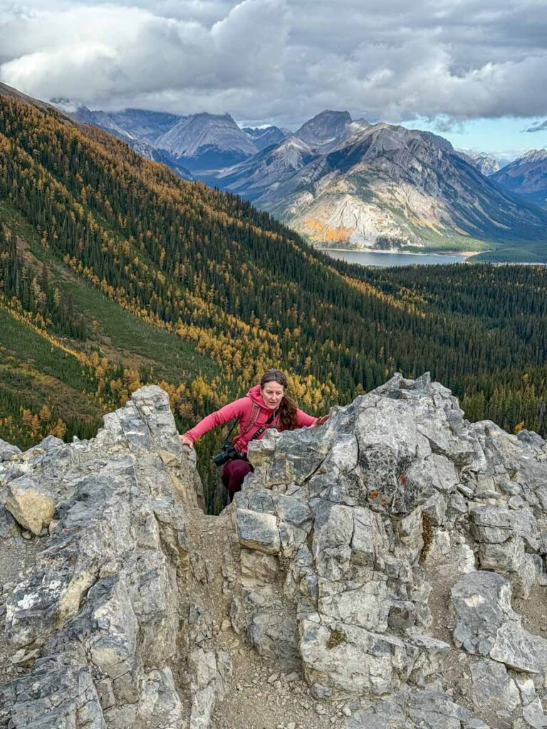 Celine Brewer, host of the Banff Travel Podcast, hikes a dangerous portion of the Tent Ridge Horseshoe Trail.