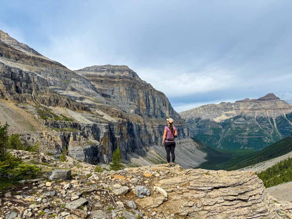 Celine Brewer, owner of TravelBanffCanada.com, enjoys views from the top of the Stanley Glacier hike in Kootenay National Park, Canada.