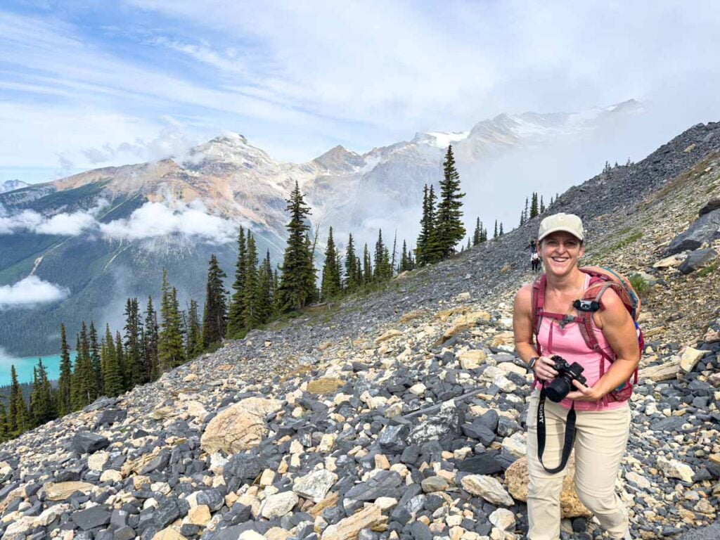 Celine Brewer, host of the Banff Travel Podcast, hikes the Burgess Shale Walcott Quarry Trail in Yoho National Park, Canada.