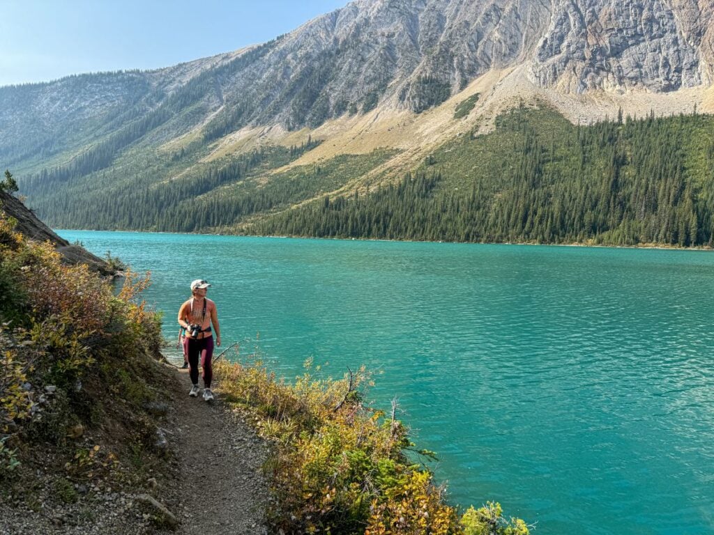 Celine Brewer hikes along the shores of Sherbrooke Lake in Yoho National Park.