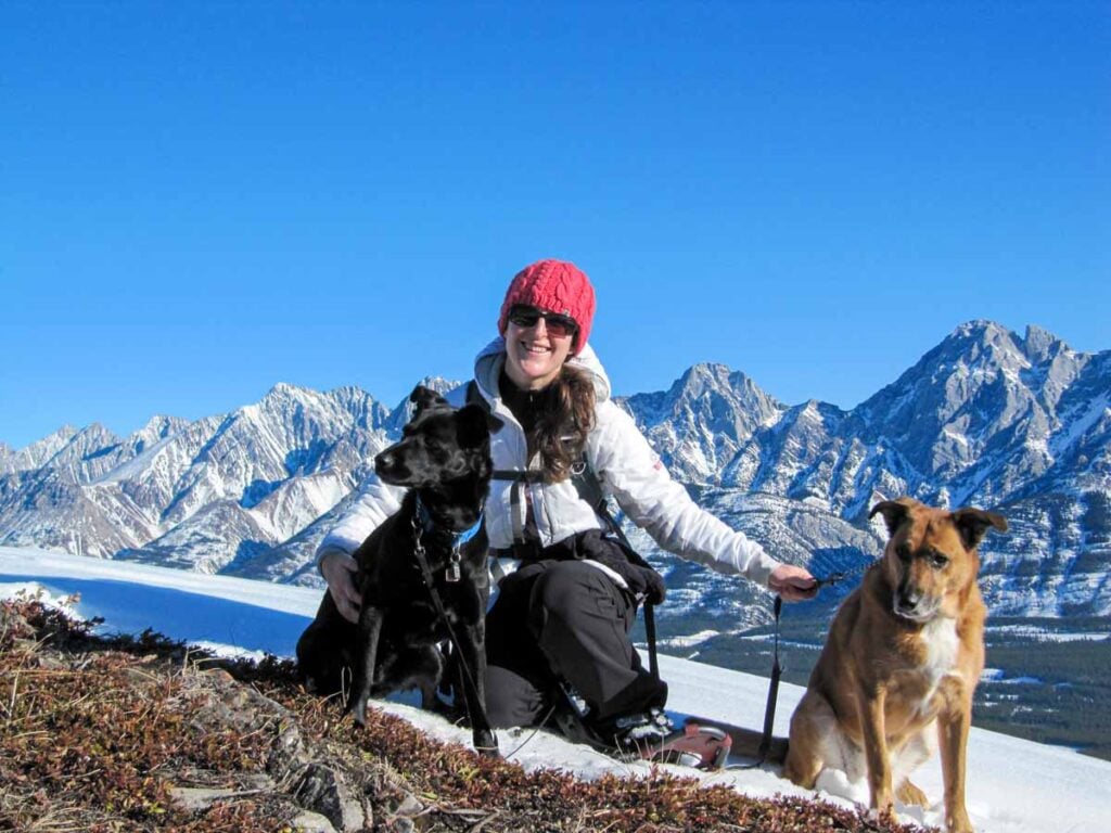 Celine Brewer and her dogs snowshoeing Gypsum Ridge in Kananaskis in February.